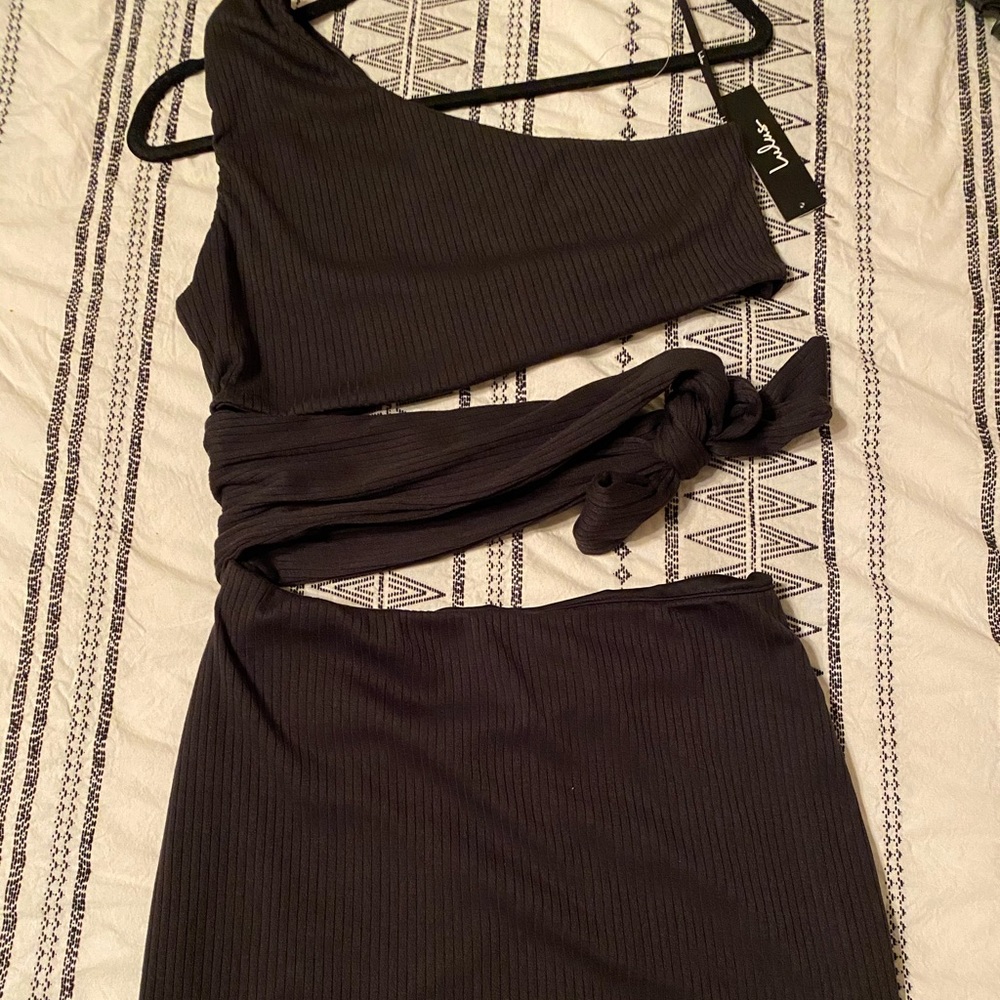 black mini dress one shoulder, with cut outs.